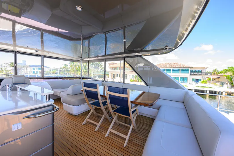 Miss Amy Yacht Photos Pics Luxurious 2020 Princess F70 yacht interior with elegant seating and dining area.