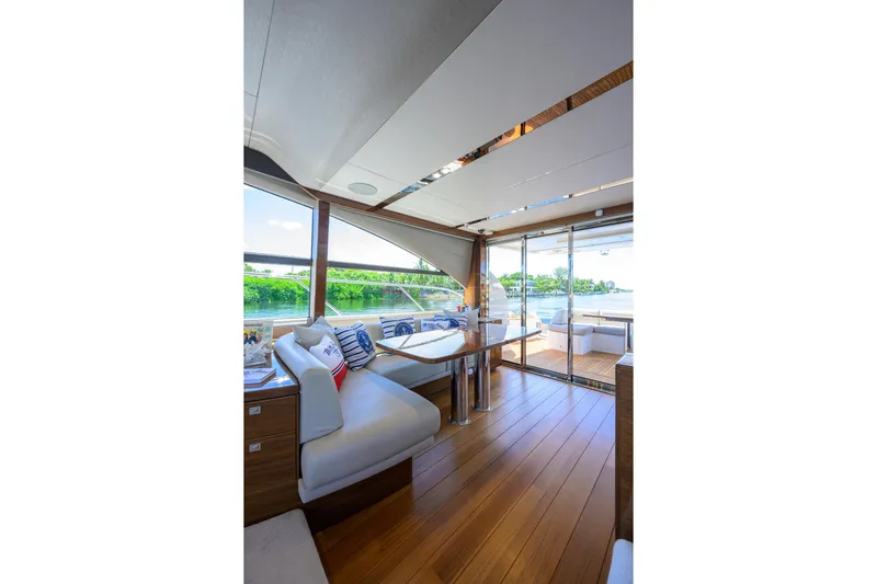 Miss Amy Yacht Photos Pics Luxurious interior of 2020 Princess F70 yacht with elegant seating and scenic views.