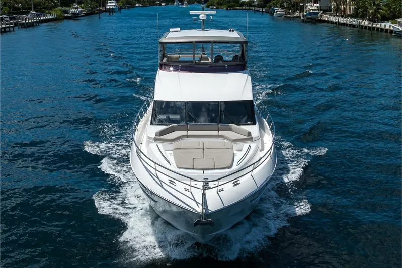 Miss Amy Yacht Photos Pics Luxurious 2020 Princess F70 yacht cruising on a scenic waterway.