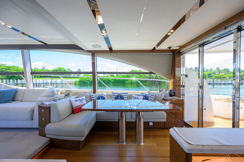 Miss Amy Yacht Photos Pics Luxurious interior of 2020 Princess F70 yacht with elegant seating and scenic views.
