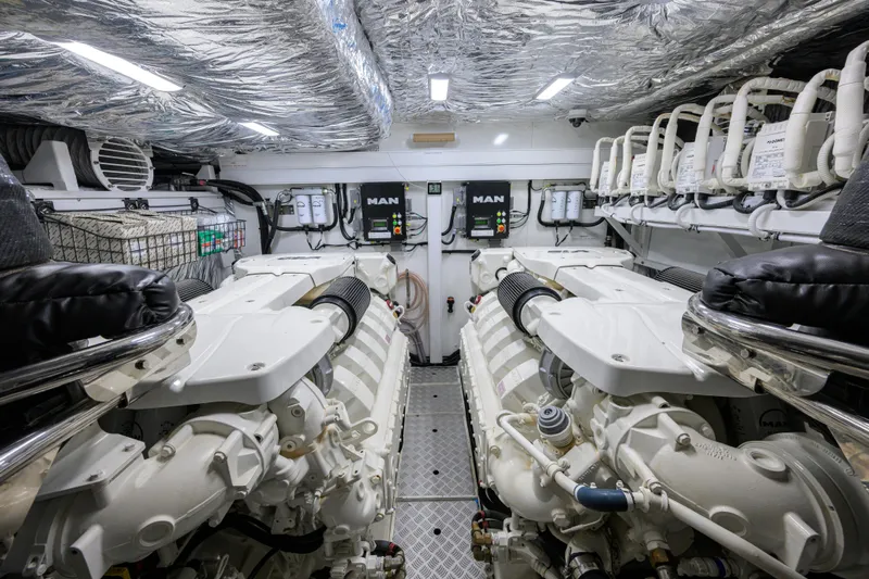 Miss Amy Yacht Photos Pics Engine room of a 2020 Princess F70 yacht, featuring dual MAN engines.