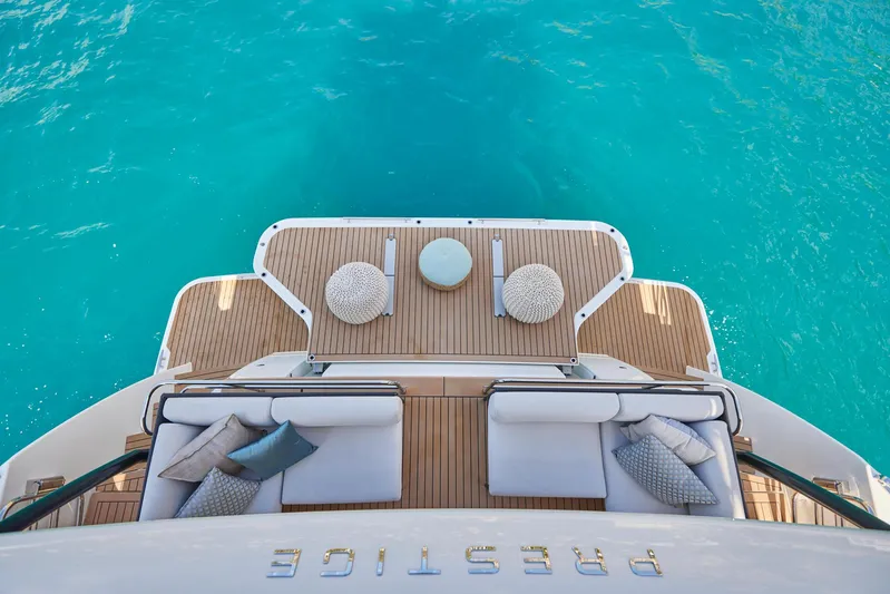  Yacht Photos Pics Prestige M48 2025 yacht deck with seating and ocean view.