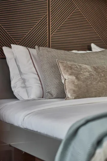  Yacht Photos Pics Luxurious Prestige M48 2025 bed with elegant pillows and modern headboard design.