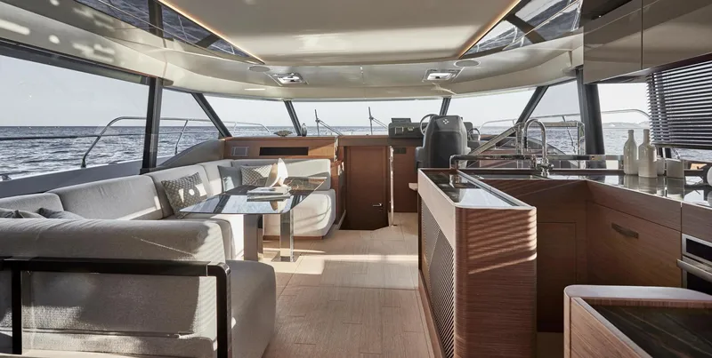 Yacht Photos Pics Luxurious interior of the 2025 Prestige M48 yacht with modern furnishings and ocean view.