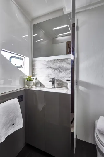 Yacht Photos Pics Modern bathroom in Prestige M48 yacht, 2025 model, featuring sleek design and contemporary fixtures.
