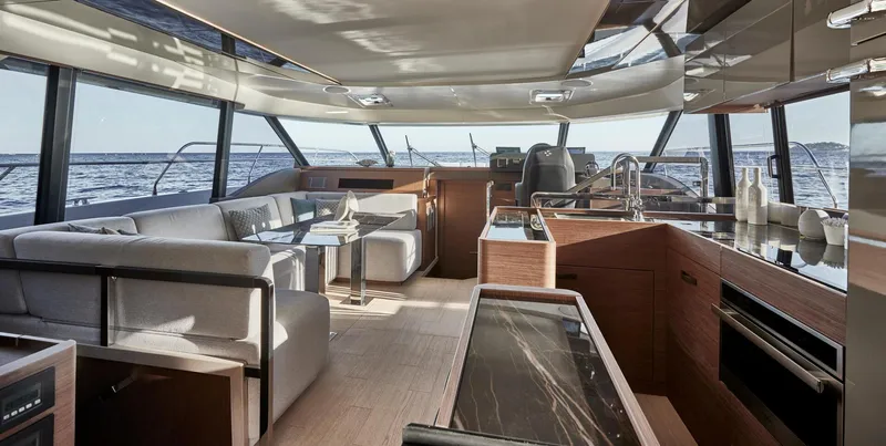  Yacht Photos Pics Luxurious interior of the 2025 Prestige M48 yacht with modern furnishings and panoramic ocean views.