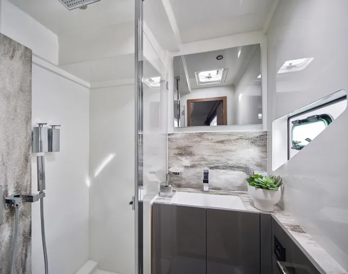  Yacht Photos Pics Modern bathroom in 2025 Prestige M48 yacht with sleek fixtures and natural light.