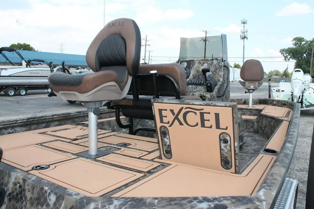 2026 Excel Bay Pro Elite 203 boat with camo design and comfortable seating.