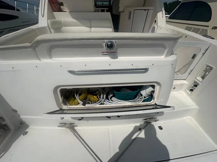 Selladoor (previously "czech Mate") Yacht Photos Pics 2007 Tiara Yachts 4300 Sovran storage compartment with coiled cables and equipment.