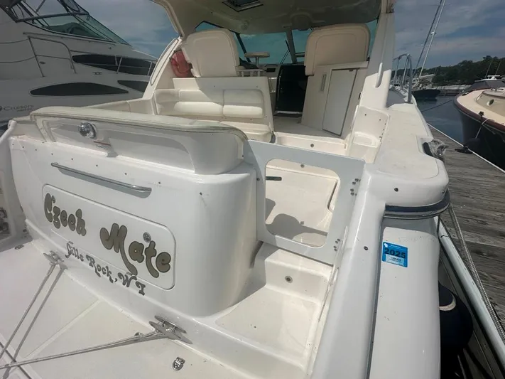 Selladoor (previously "czech Mate") Yacht Photos Pics 2007 Tiara Yachts 4300 Sovran docked, featuring spacious seating and sleek design.