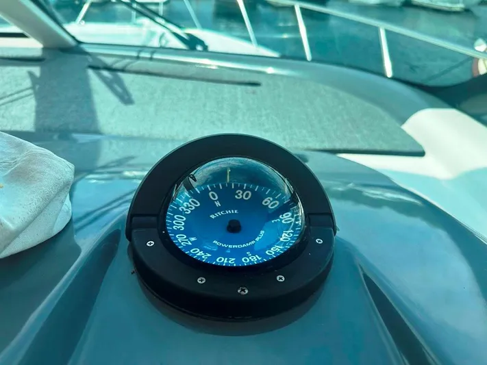 Selladoor (previously "czech Mate") Yacht Photos Pics Compass on 2007 Tiara Yachts 4300 Sovran dashboard, marine navigation equipment.