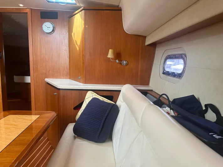 Selladoor (previously "czech Mate") Yacht Photos Pics Interior of 2007 Tiara Yachts 4300 Sovran with wood finish and comfortable seating.