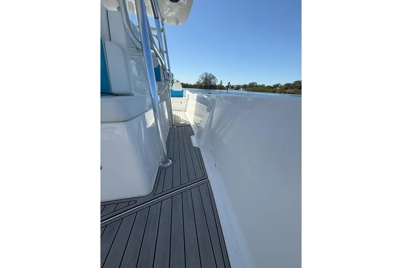  Yacht Photos Pics 2021 Custom Infusion 34 CC boat deck with sleek design and blue seating.