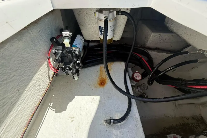  Yacht Photos Pics 2021 Custom Infusion 34 CC boat engine compartment with fuel filter and wiring.