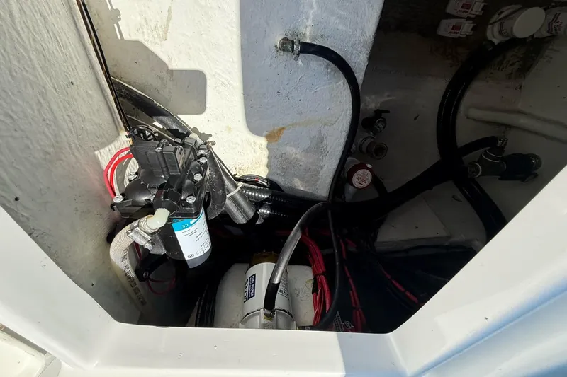  Yacht Photos Pics Electrical and plumbing components inside a 2021 Custom Infusion 34 CC boat.