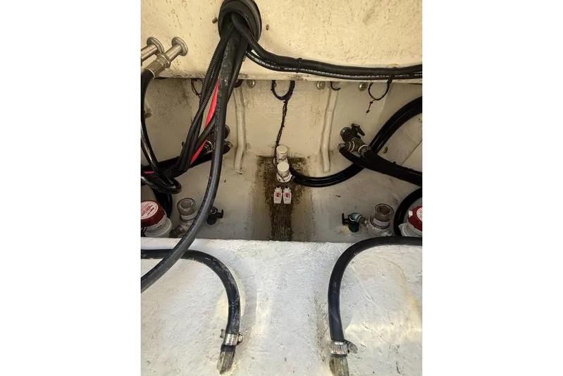  Yacht Photos Pics Engine compartment of 2021 Custom Infusion 34 CC with visible wiring and hoses.