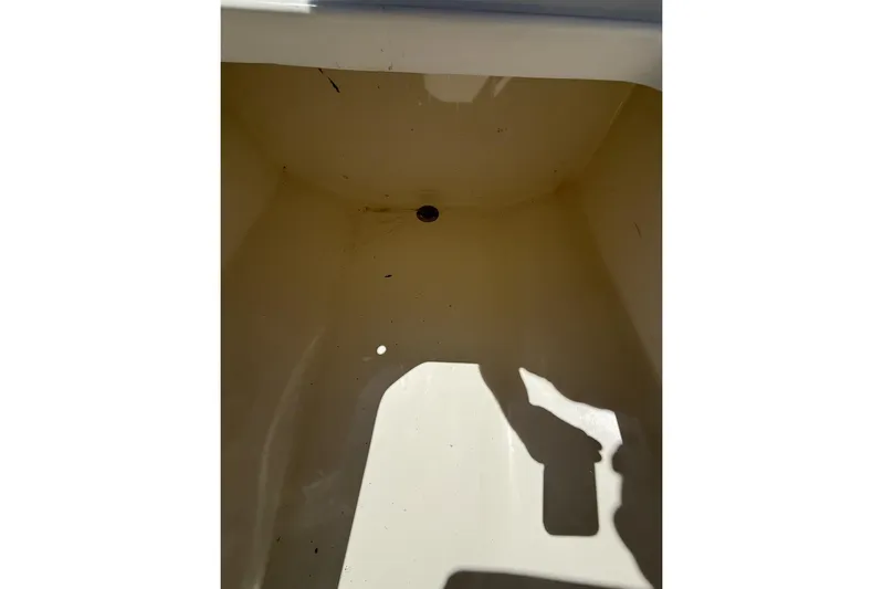  Yacht Photos Pics Empty storage compartment of 2021 Custom Infusion 34 CC boat.