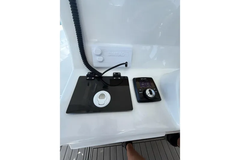  Yacht Photos Pics Control panel of 2021 Custom Infusion 34 CC boat with Simrad electronics.