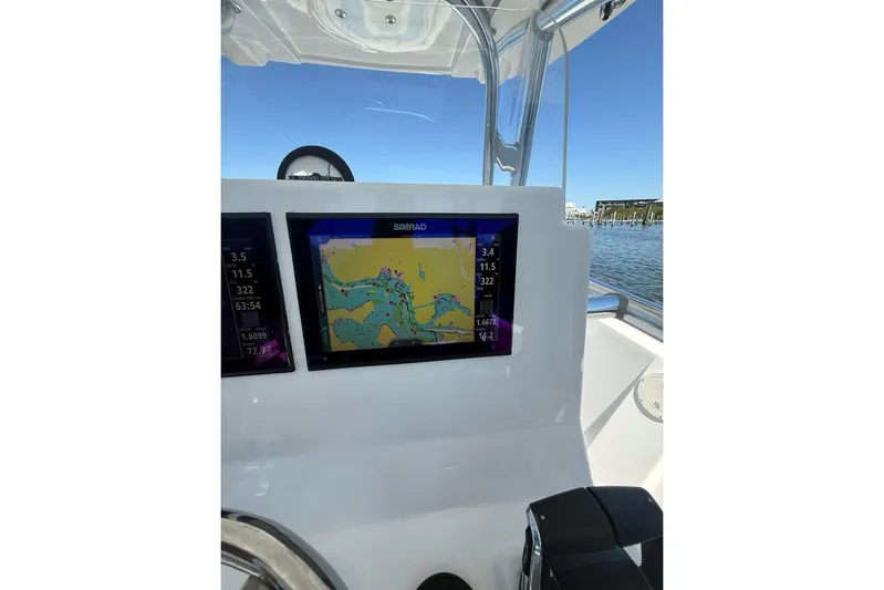  Yacht Photos Pics Center console of 2021 Custom Infusion 34 CC boat with navigation display.