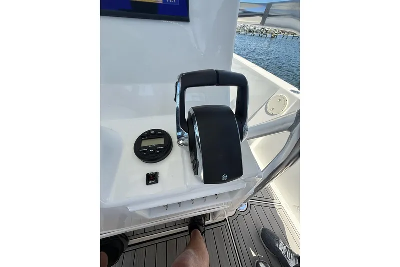  Yacht Photos Pics Control panel of 2021 Custom Infusion 34 CC boat with throttle and display.