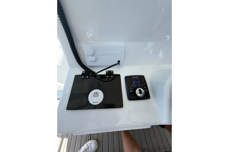  Yacht Photos Pics Control panel of 2021 Custom Infusion 34 CC boat with Simrad equipment.