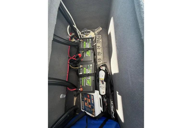  Yacht Photos Pics Interior view of 2021 Custom Infusion 34 CC showing battery compartment and equipment storage.