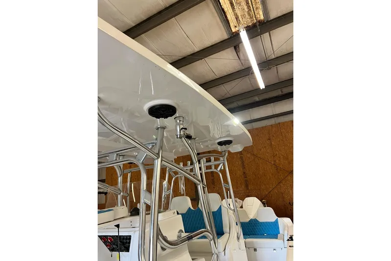  Yacht Photos Pics 2021 Custom Infusion 34 CC boat interior with blue seating and metal framework.