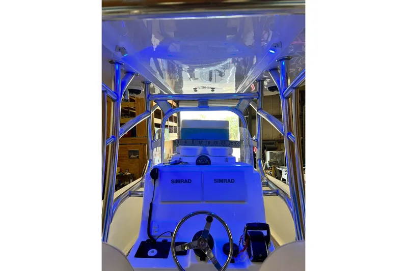  Yacht Photos Pics 2021 Custom Infusion 34 CC boat interior with Simrad electronics and blue lighting.