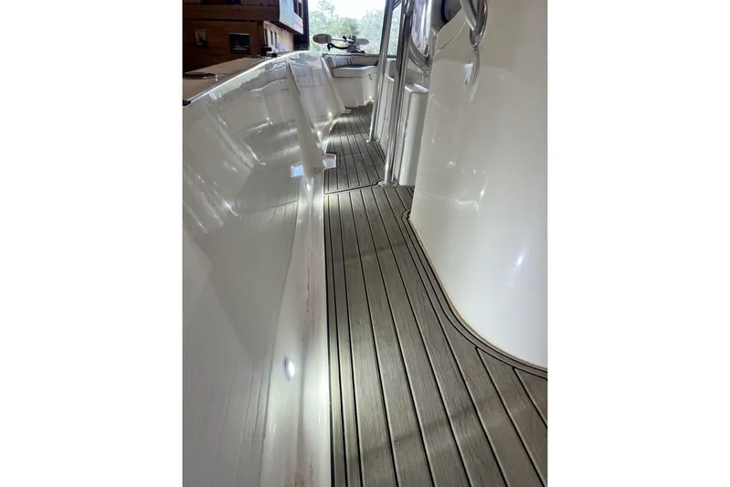  Yacht Photos Pics Custom Infusion 34 CC 2021 boat deck with sleek design and modern finish.