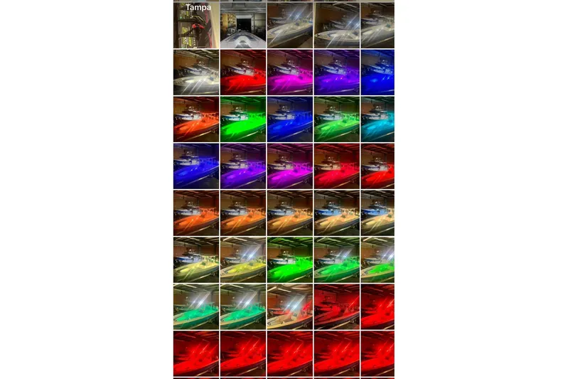  Yacht Photos Pics Custom Infusion 34 CC 2021 boat with vibrant LED lighting in various colors.