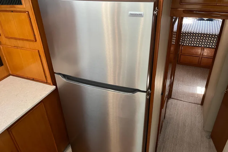 Floridita Yacht Photos Pics Stainless steel Frigidaire refrigerator in 1997 Post Sportfish yacht kitchen.