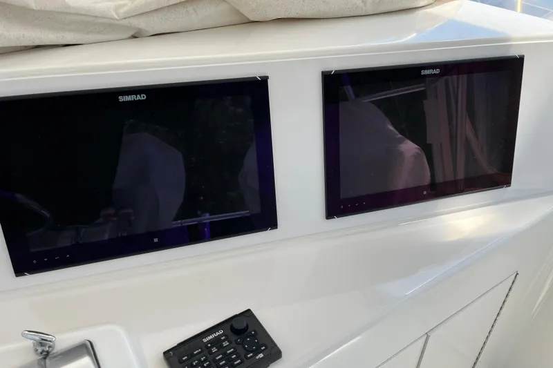 Floridita Yacht Photos Pics Dual Simrad displays on 1997 Post Sportfish boat dashboard.