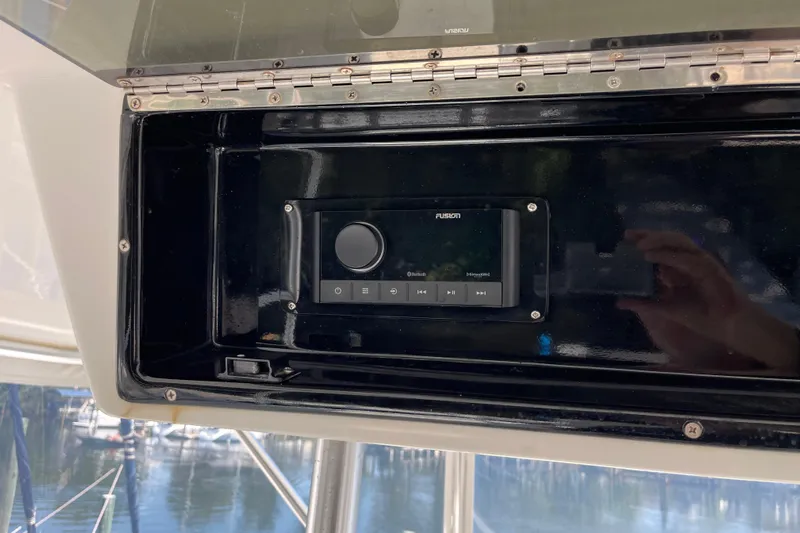 Floridita Yacht Photos Pics 1997 Post Sportfish boat with Fusion stereo system in black compartment.