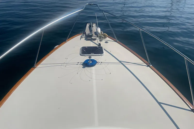 Ripple Yacht Photos Pics Bow view of 1998 Little Harbor WhisperJet 36 on calm water.