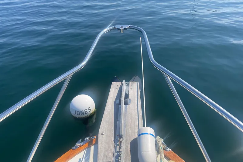 Ripple Yacht Photos Pics Bow of 1998 Little Harbor WhisperJet 36 near buoy on calm water.