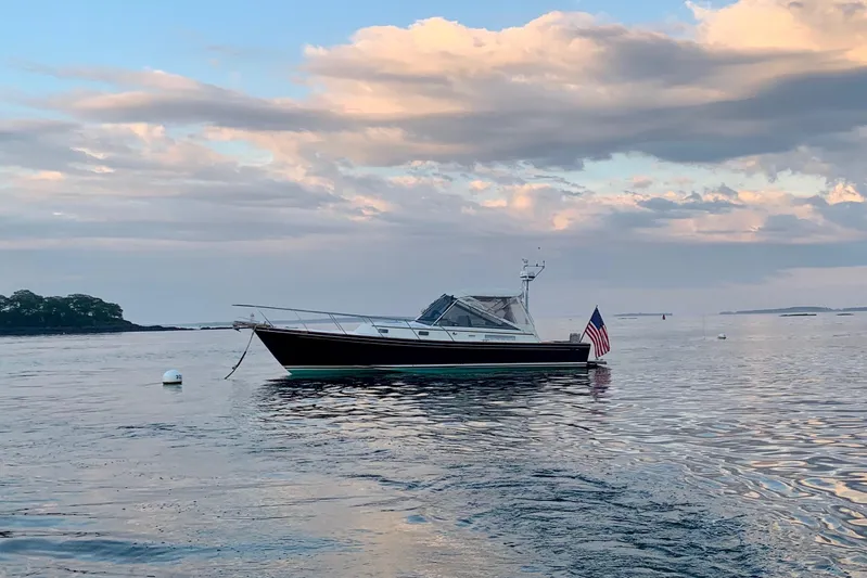 Ripple Yacht Photos Pics 1998 Little Harbor WhisperJet 36 boat on calm water at sunset.