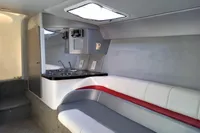 2013 Formula Thunderbird 353 FASTECH cabin with modern seating and compact kitchenette.