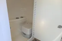 Compact bathroom in 2013 Formula Thunderbird 353 FASTECH boat.