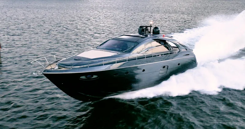  Yacht Photos Pics Luxurious 2017 Pershing 70 yacht cruising swiftly on open water.