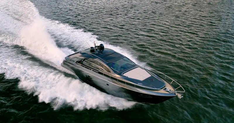  Yacht Photos Pics Luxury 2017 Pershing 70 yacht cruising swiftly on open water.