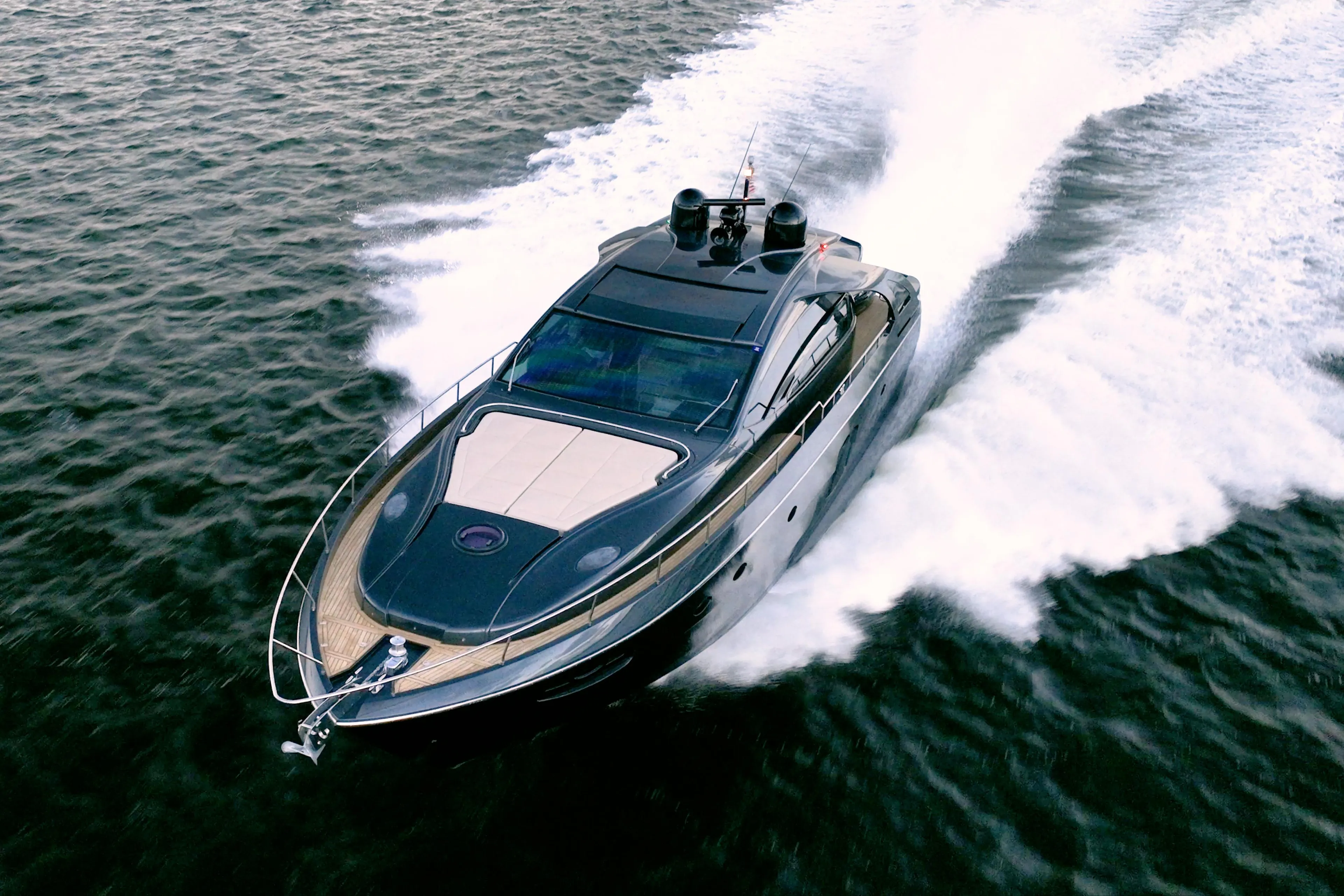 2017 Pershing 70 yacht cruising swiftly on open water.
