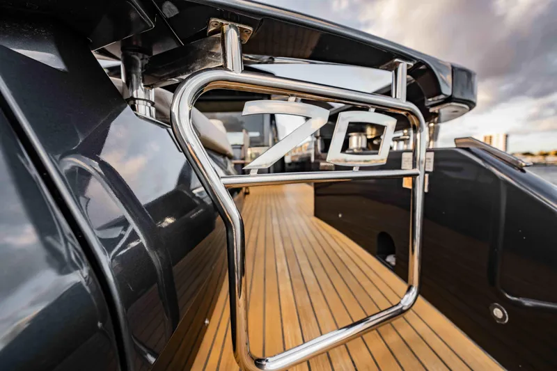  Yacht Photos Pics Luxurious 2017 Pershing 70 yacht with sleek design and wooden deck.