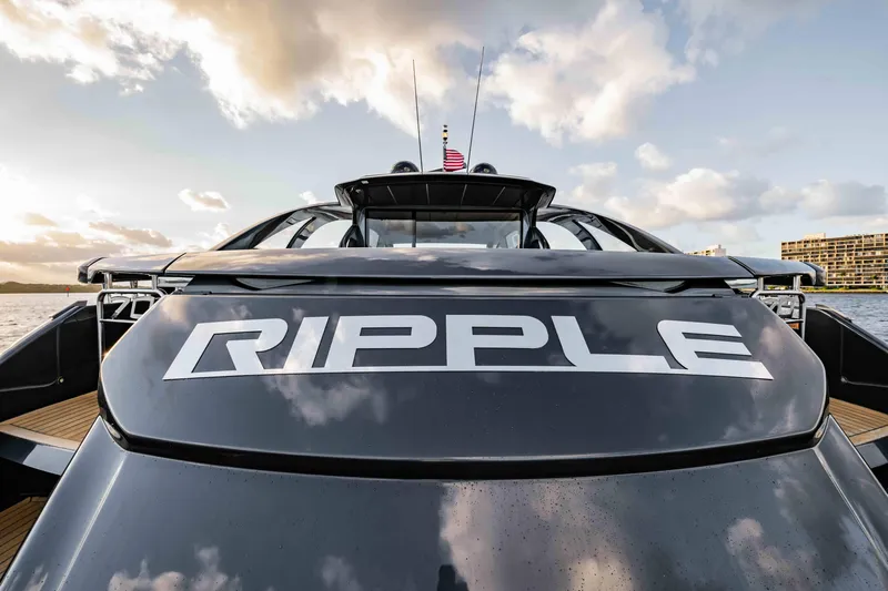  Yacht Photos Pics 2017 Pershing 70 yacht named "RIPPLE" on water, showcasing sleek design and luxury features.