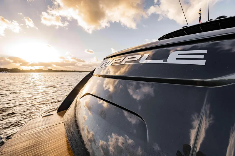  Yacht Photos Pics 2017 Pershing 70 yacht "Ripple" at sunset on the water.