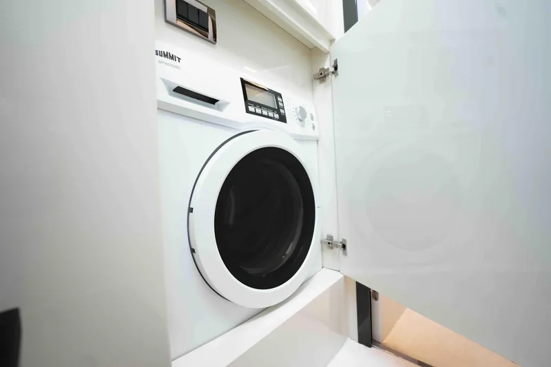  Yacht Photos Pics Built-in washing machine inside a Pershing 70 yacht, 2017 model.