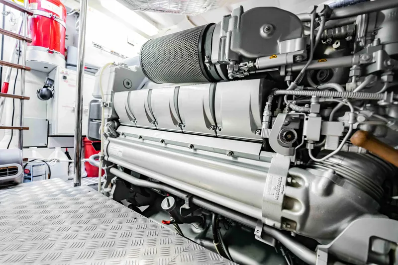  Yacht Photos Pics Engine room of a 2017 Pershing 70 yacht, showcasing advanced machinery and equipment.