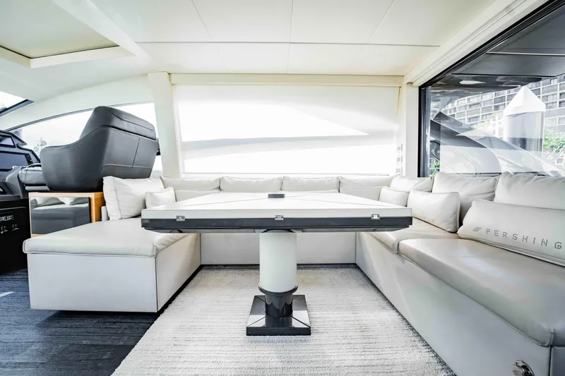  Yacht Photos Pics Luxurious interior of a 2017 Pershing 70 yacht with elegant seating and modern design.