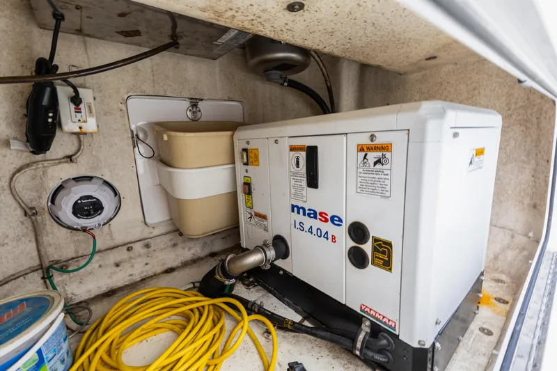  Yacht Photos Pics 2018 Yellowfin 42 Offshore boat generator compartment with Mase I.S. 4.0 B generator.