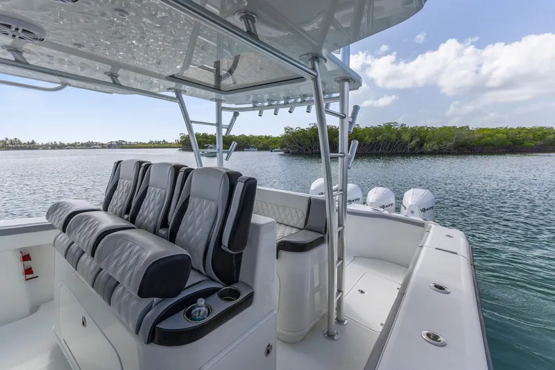 Yacht Photos Pics 2018 Yellowfin 42 Offshore boat interior with luxury seating and ocean view.