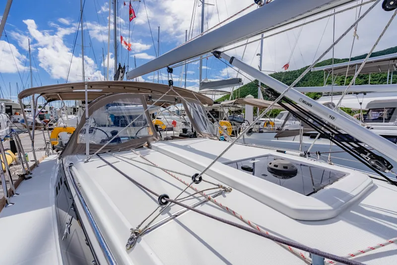 Minx Yacht Photos Pics 2024 Jeanneau Sun Odyssey 349 sailboat docked, featuring sleek design and modern rigging.